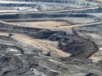 but-thousands-flock-here-to-make-real-money-in-the-oil-sands--where-creating-synthetic-crude-begins-in-the-strip-mine